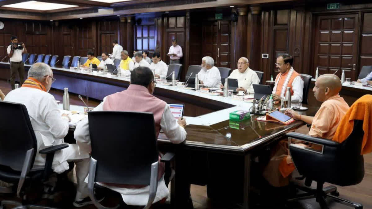 UP Chief Minister Yogi Adityanath with government officials.